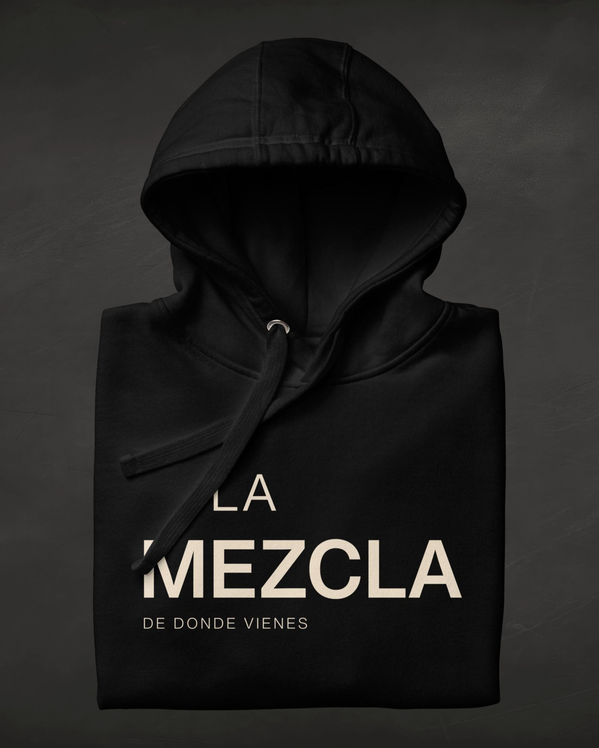 Black hoodie with 'La Mezcla' text on a dark background