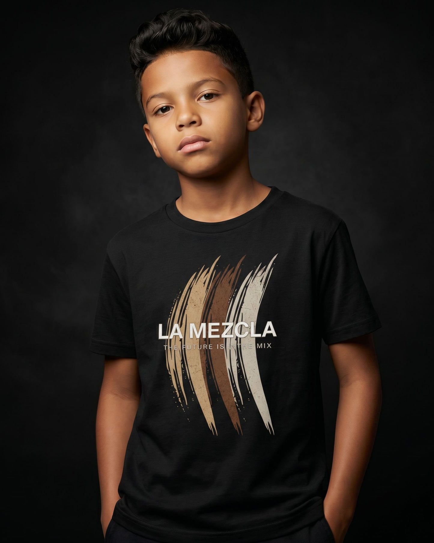 Child wearing a black 'La Mezcla' t-shirt against a dark background