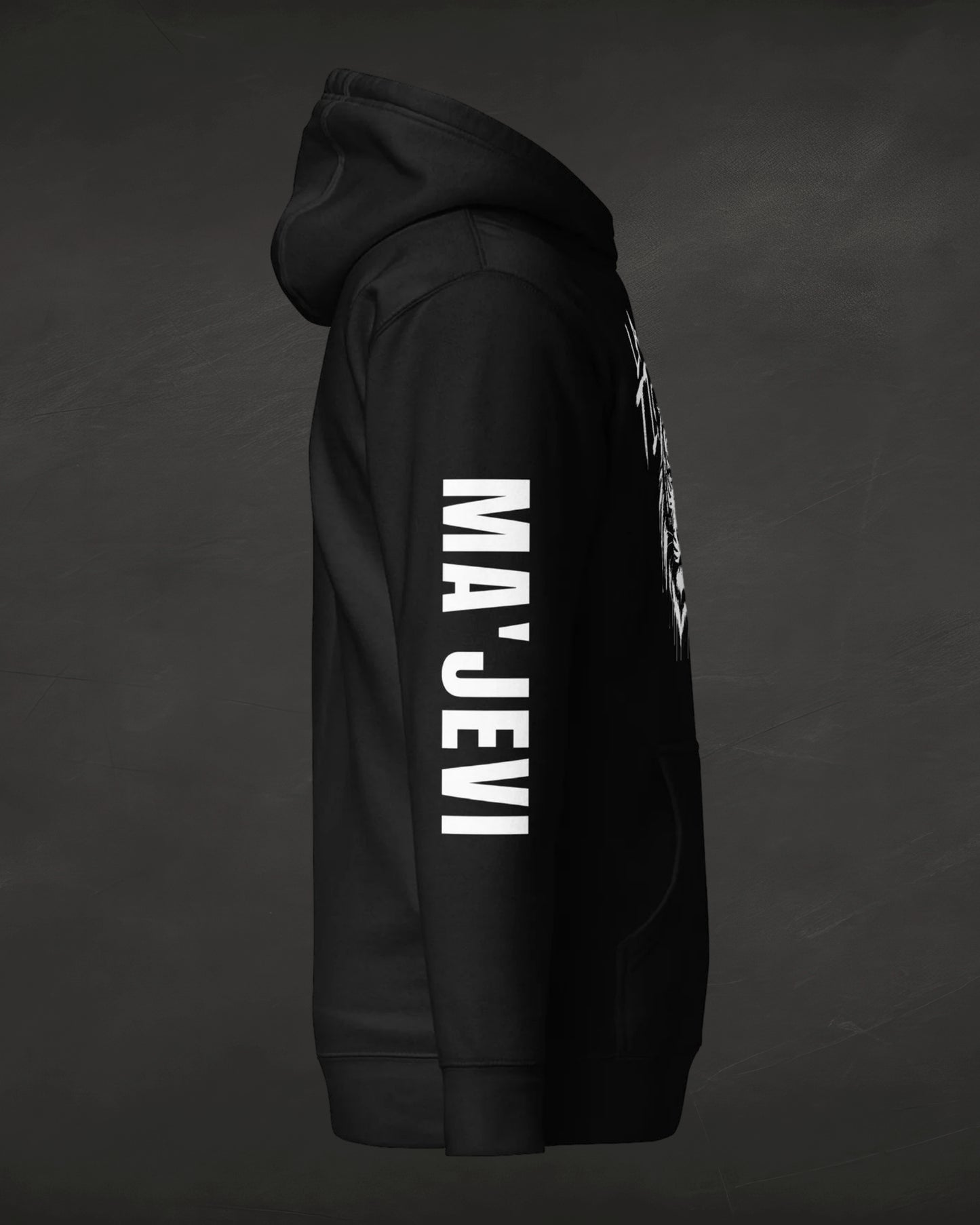 Black hoodie with 'MA'JEVI' text on a dark background
