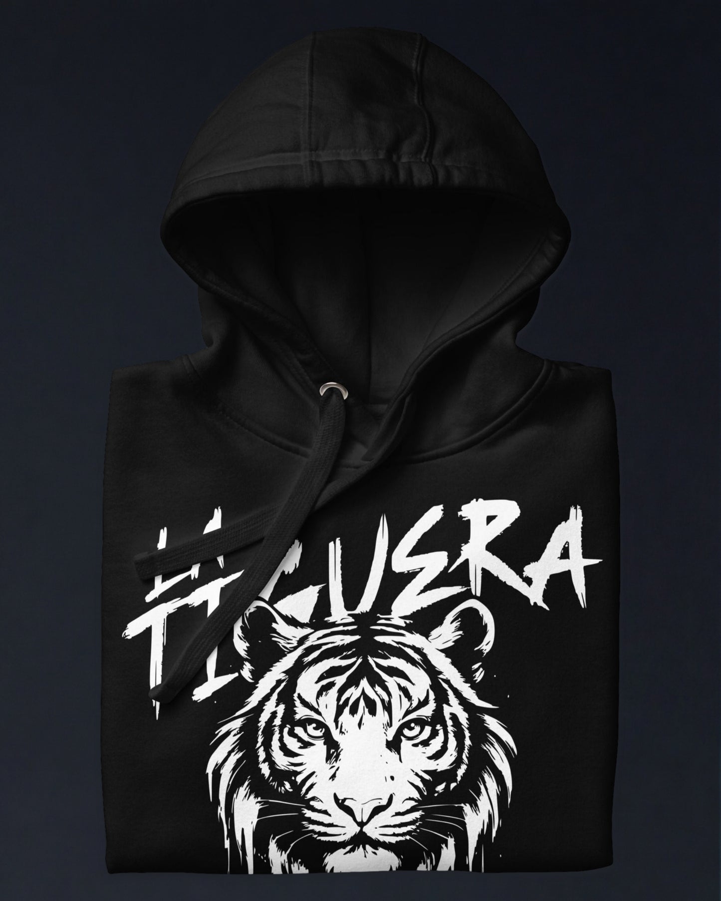 Black hoodie with a white tiger graphic and text on a dark background