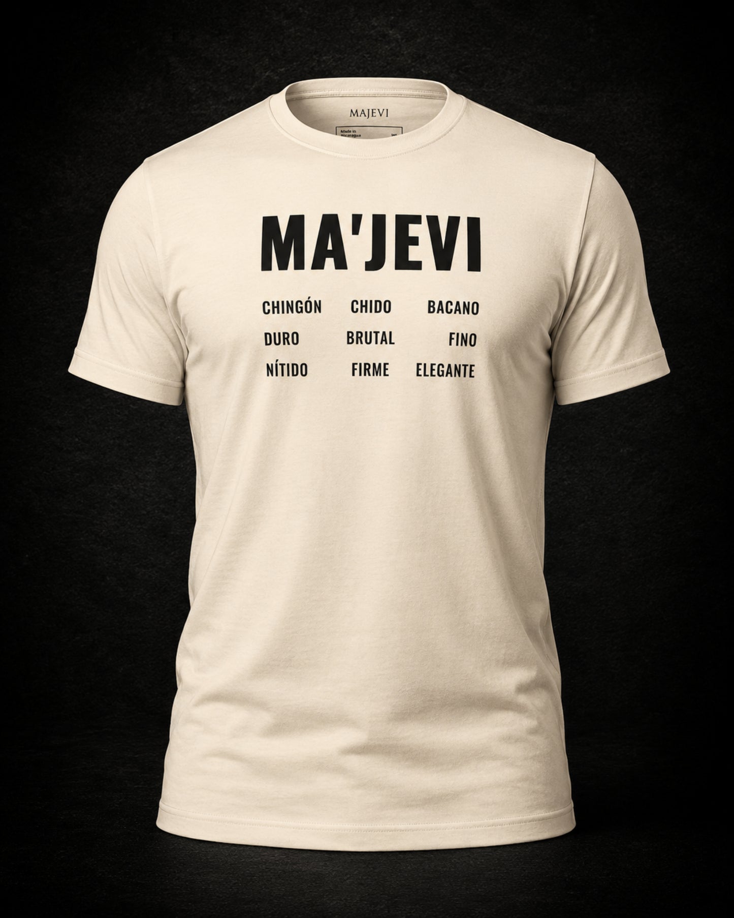 Beige t-shirt with black text on a dark background