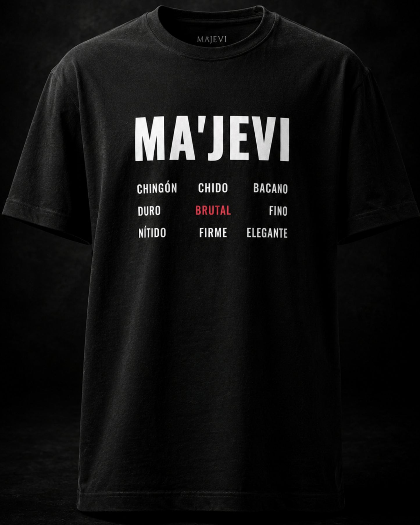 Black t-shirt with 'MA'JEVI' text and descriptors on a dark background